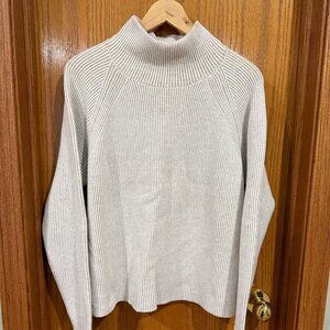 cyrus ribbed mock neck sweater in light tan size L like new